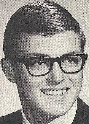 obit photo of Mike Wolf as a youth