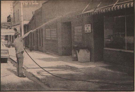 Cleaning ash from Pomeroy streets, May, 1980