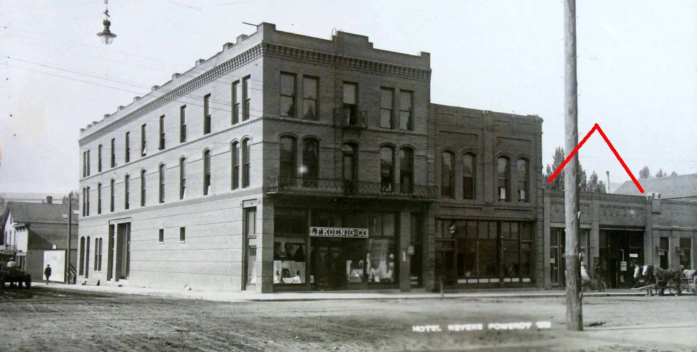 Photo of Main street, Pomeroy, showing (left to right) The Revere Hotel, the Revere Hotel Brick Addition, and hidden partially behind a telephone pole, the Koller building.